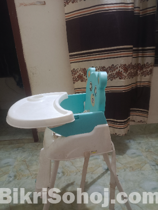 Feeding chair and baby carrier